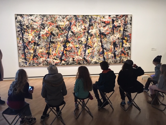 Students studying Blue Poles Artwork at The National Gallery