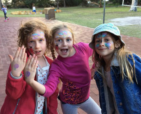 3 girls with facepaint on their faces